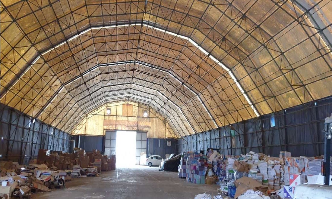 NADAF warehouse with paper and cardboard stock being sorted